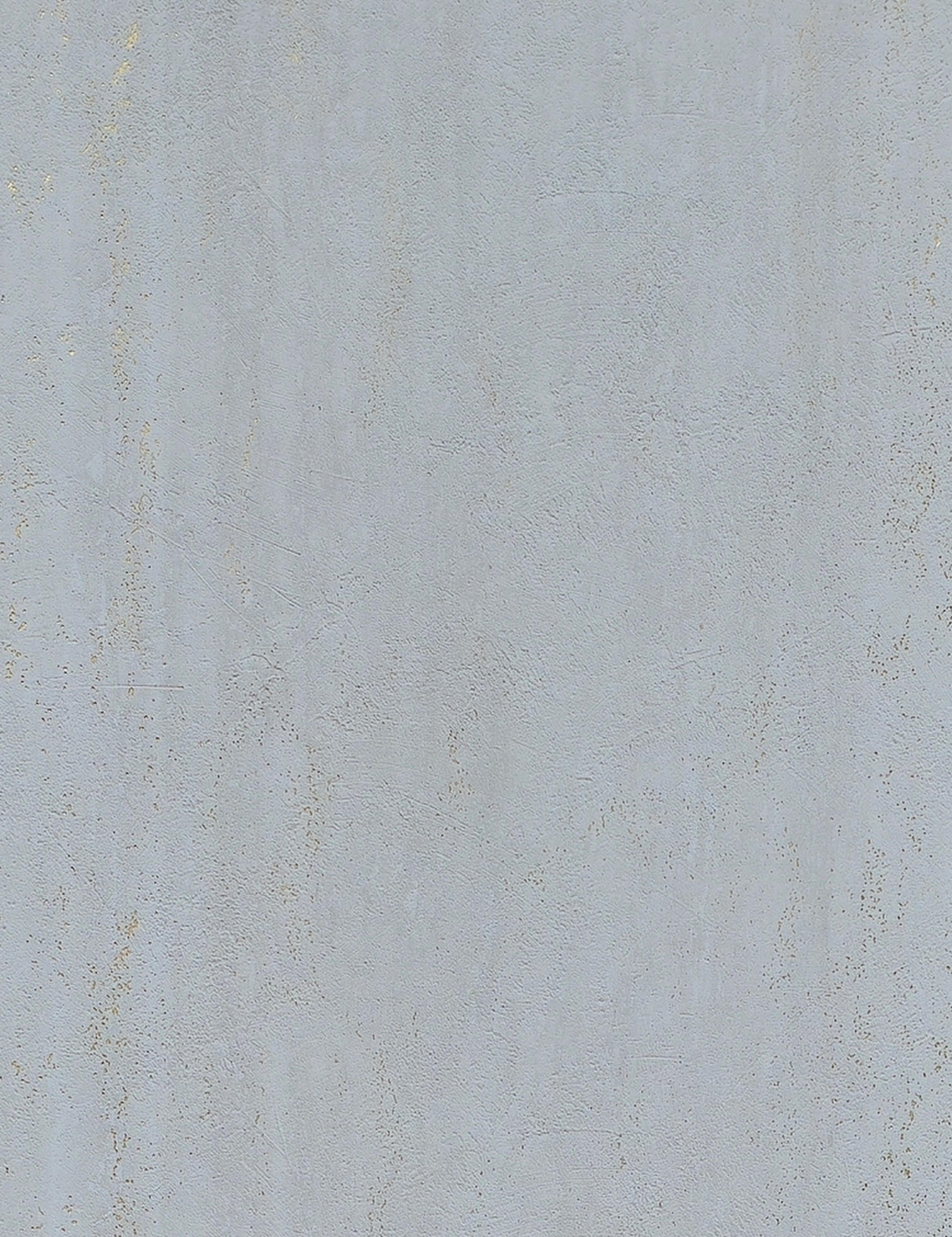Light grey textured wall panel with subtle beige speckles and rough surface finish.