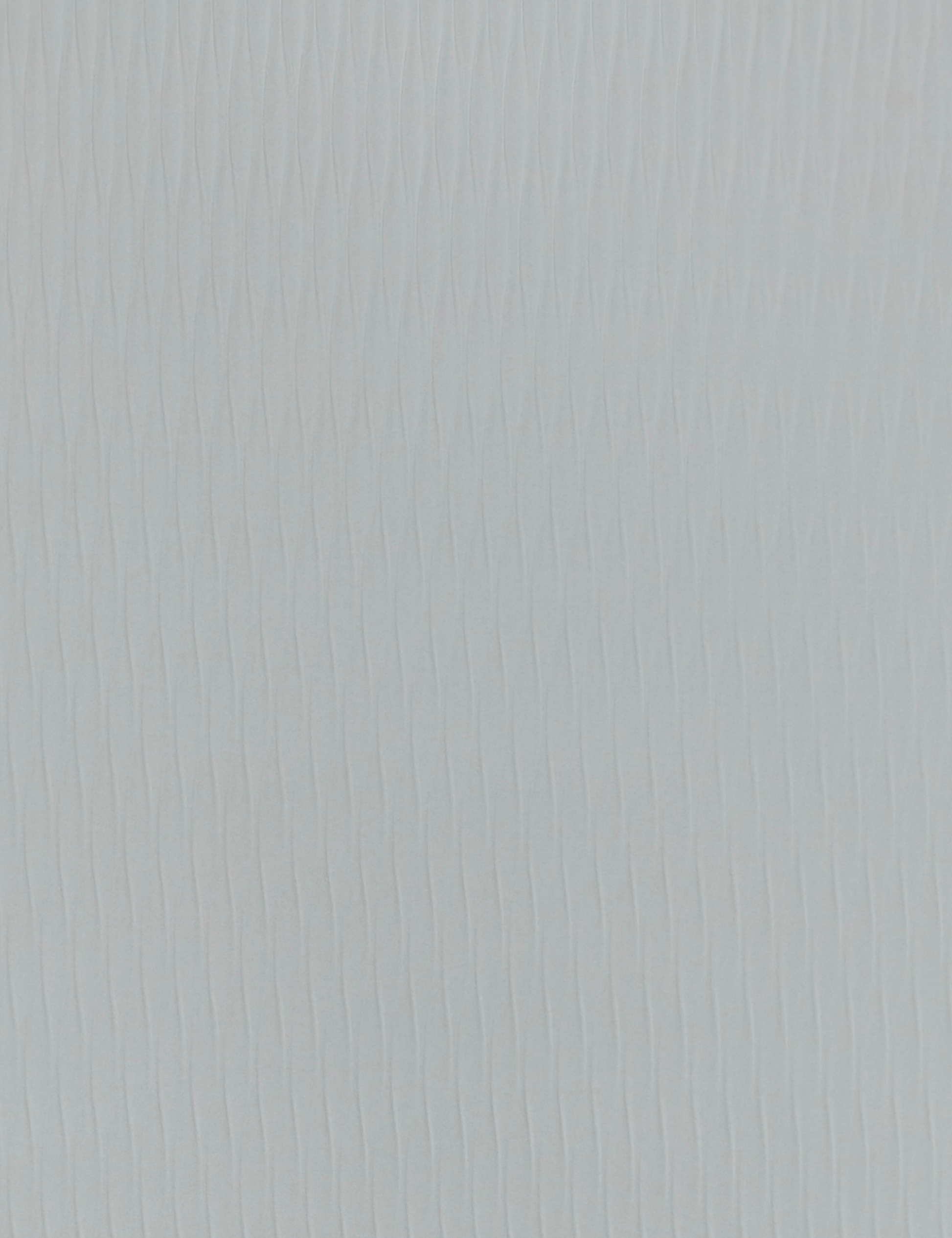 Light gray wall panel with vertical fluted texture and subtle sheen.