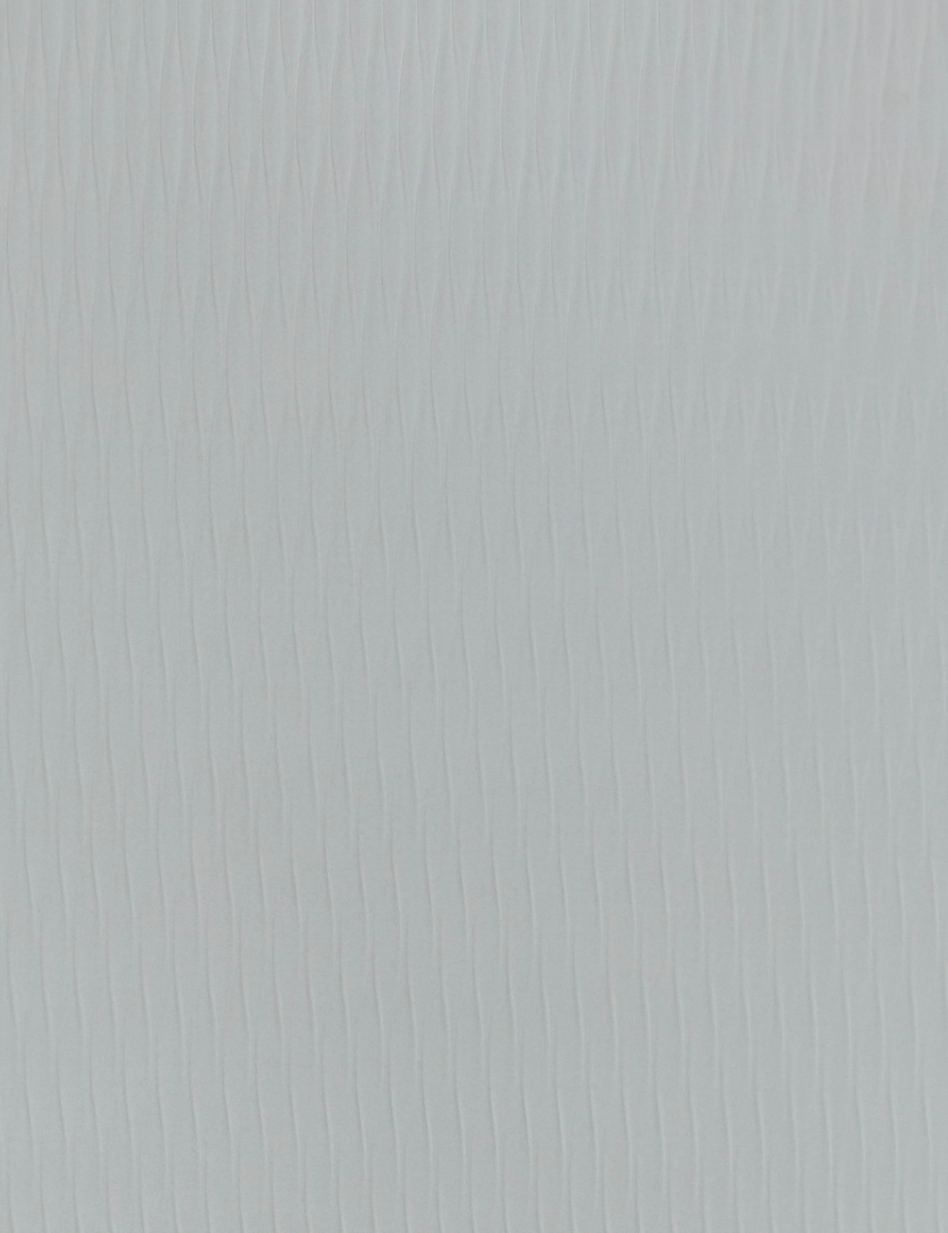 Light gray wall panel with vertical fluted texture and subtle sheen.
