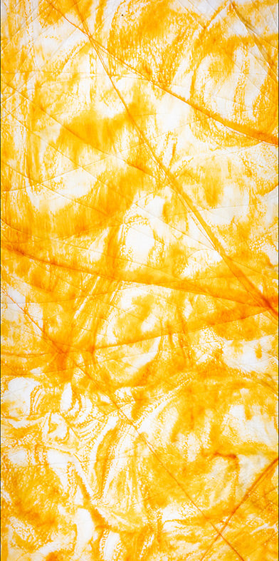 Yellow marble wall panel with textured finish and veining pattern, showcasing a stone appearance with irregular creases and
