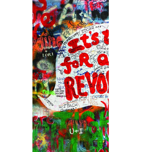 Multicolored graffiti laminate with suede finish, featuring bold red text and abstract designs, showcasing a designer