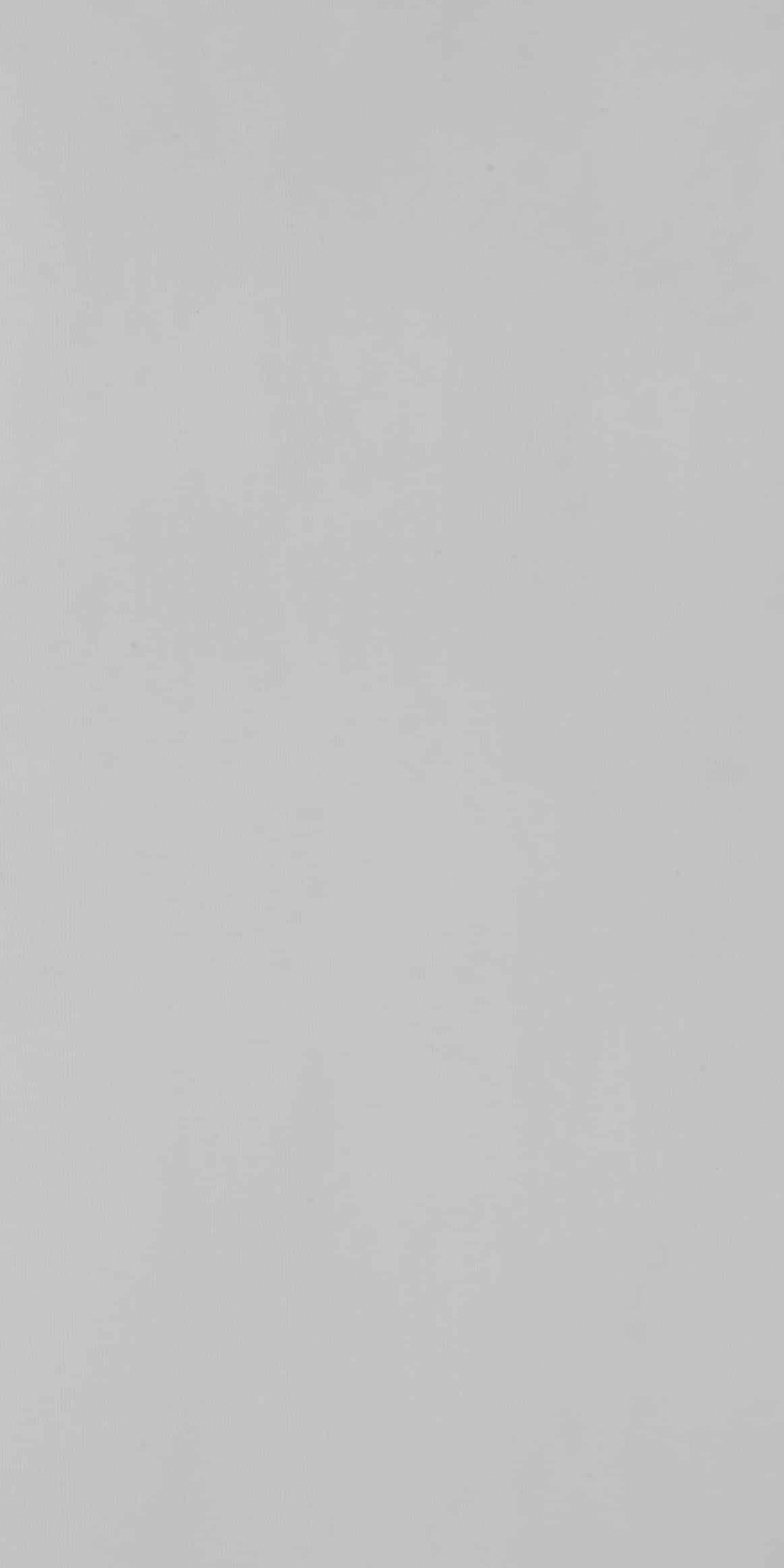 Grey suede finish solid color laminate with subtle texture and uniform tone.