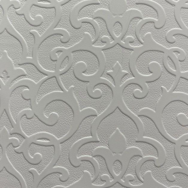 White designer wall panel with textured embossed floral pattern and intricate details in a repeating design.