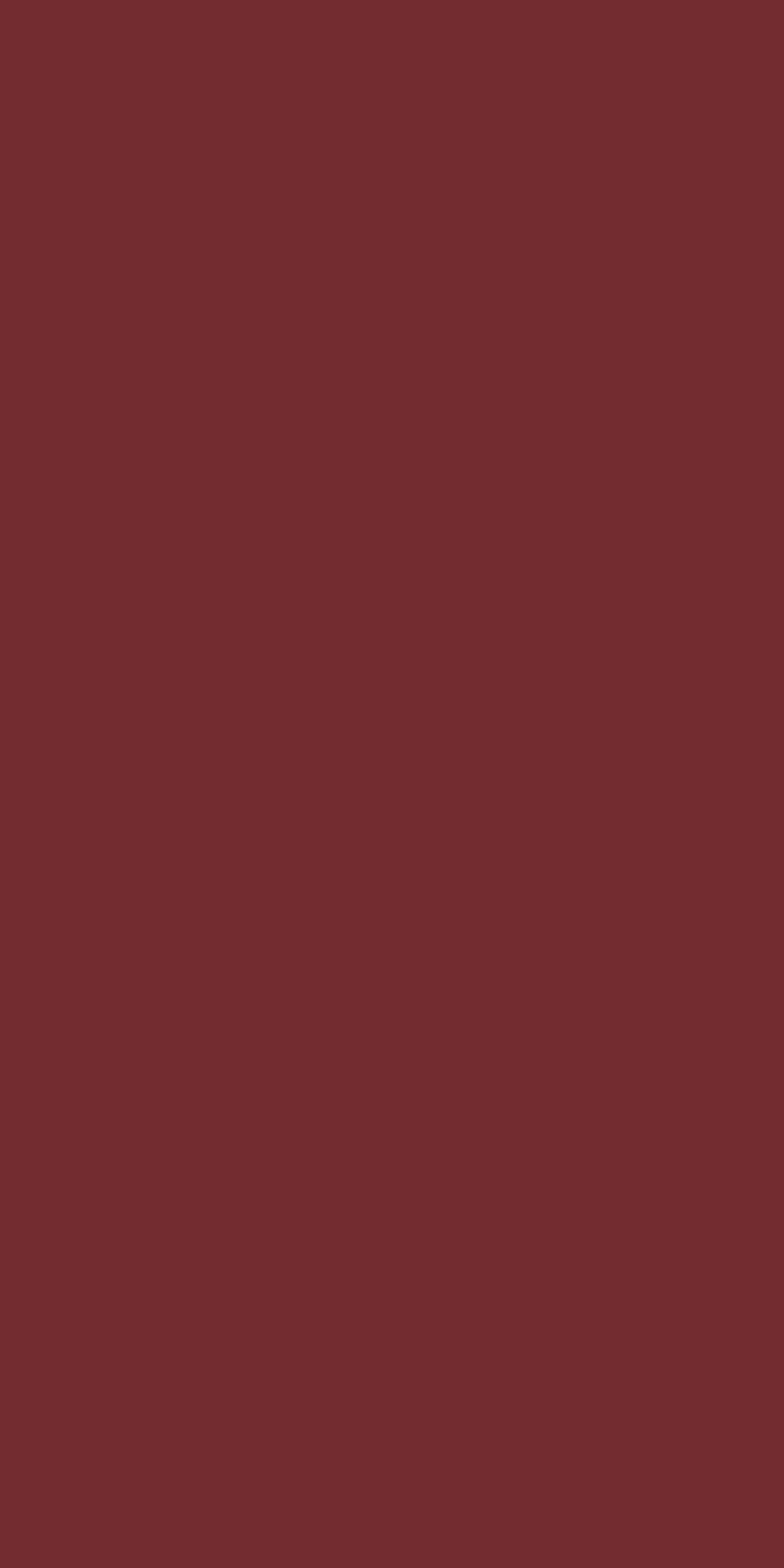 Burgundy suede finish laminate with solid color texture and matte sheen