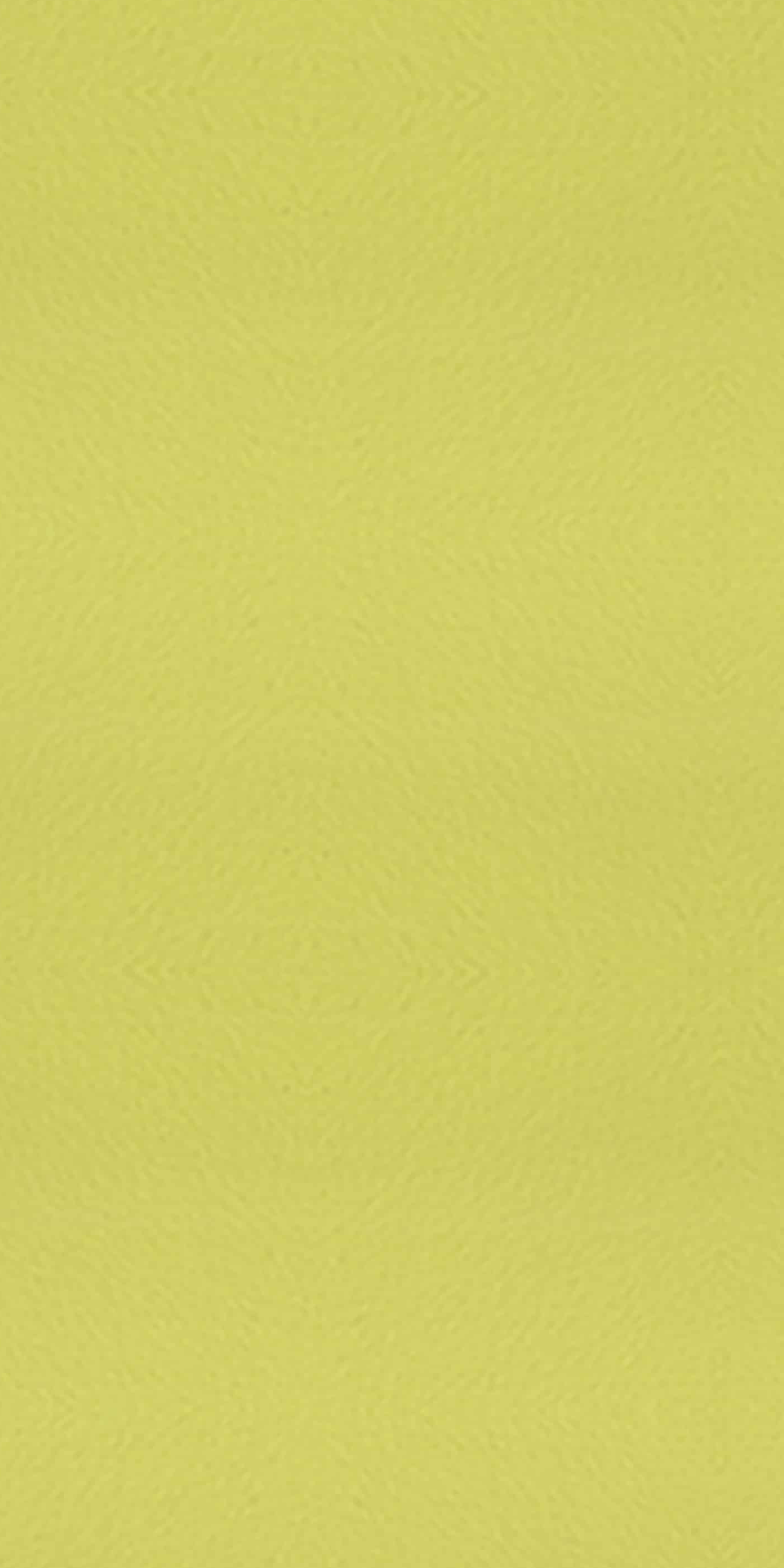 Yellow suede finish laminate with textured surface and solid color appearance