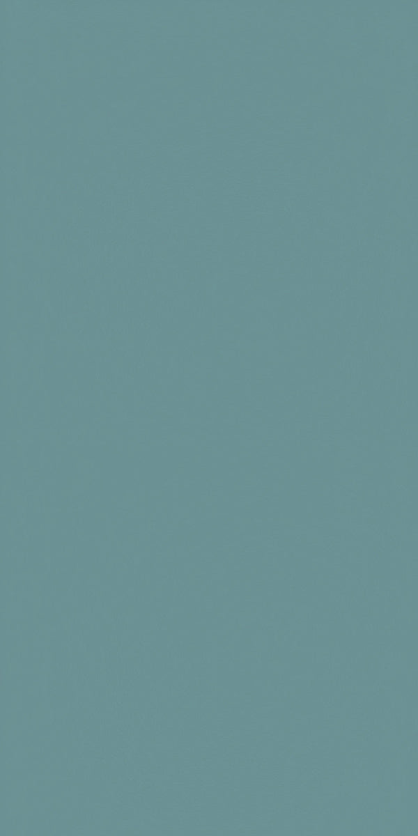 Blue suede decorative laminate with plain color and matte finish, showing uniform texture and subtle sheen.