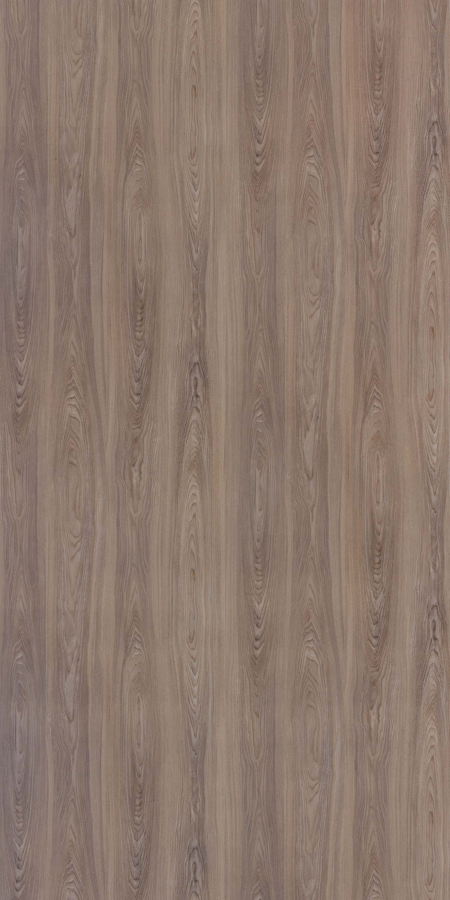 Grey wood grain laminate with suede finish and vertical wood pattern texture
