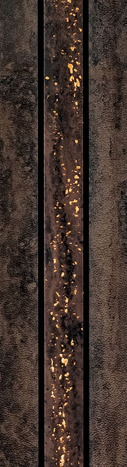 Brown textured designer louver panel with gold flecks and rough surface finish, showcasing a unique pattern and metallic