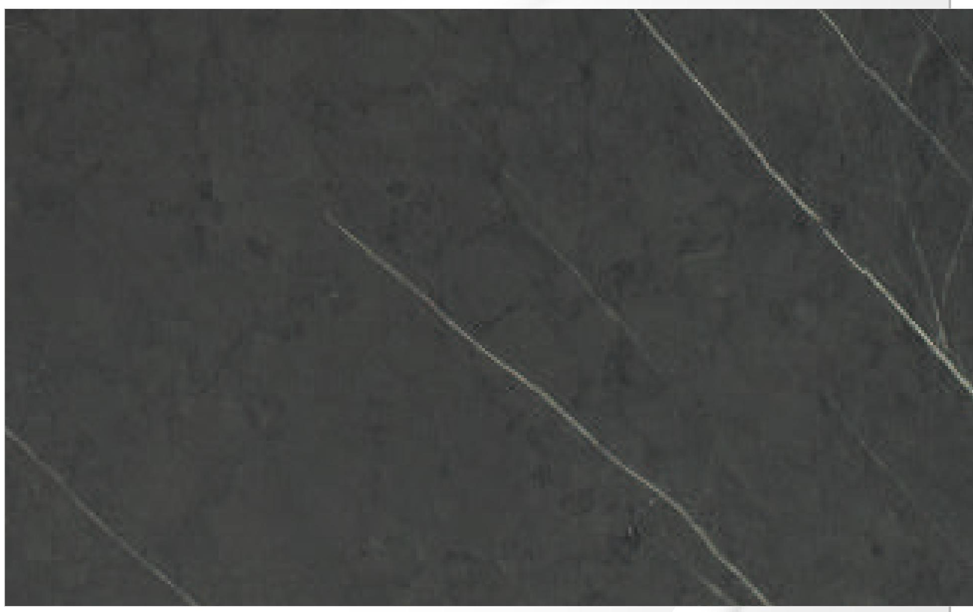 Dark grey marble-effect decorative MDF with white veining and textured finish.