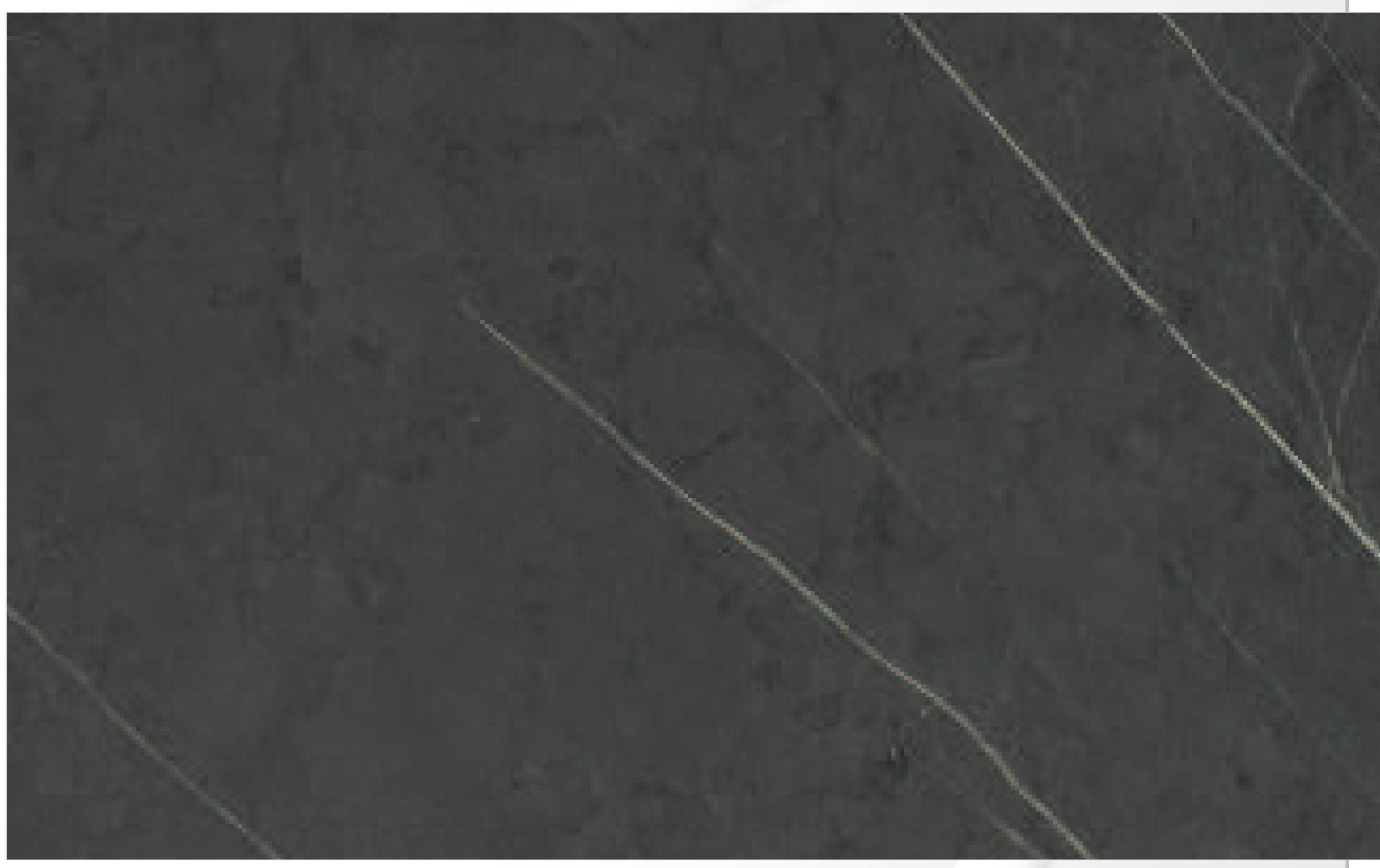 Dark grey marble-effect decorative MDF with white veining and textured finish.
