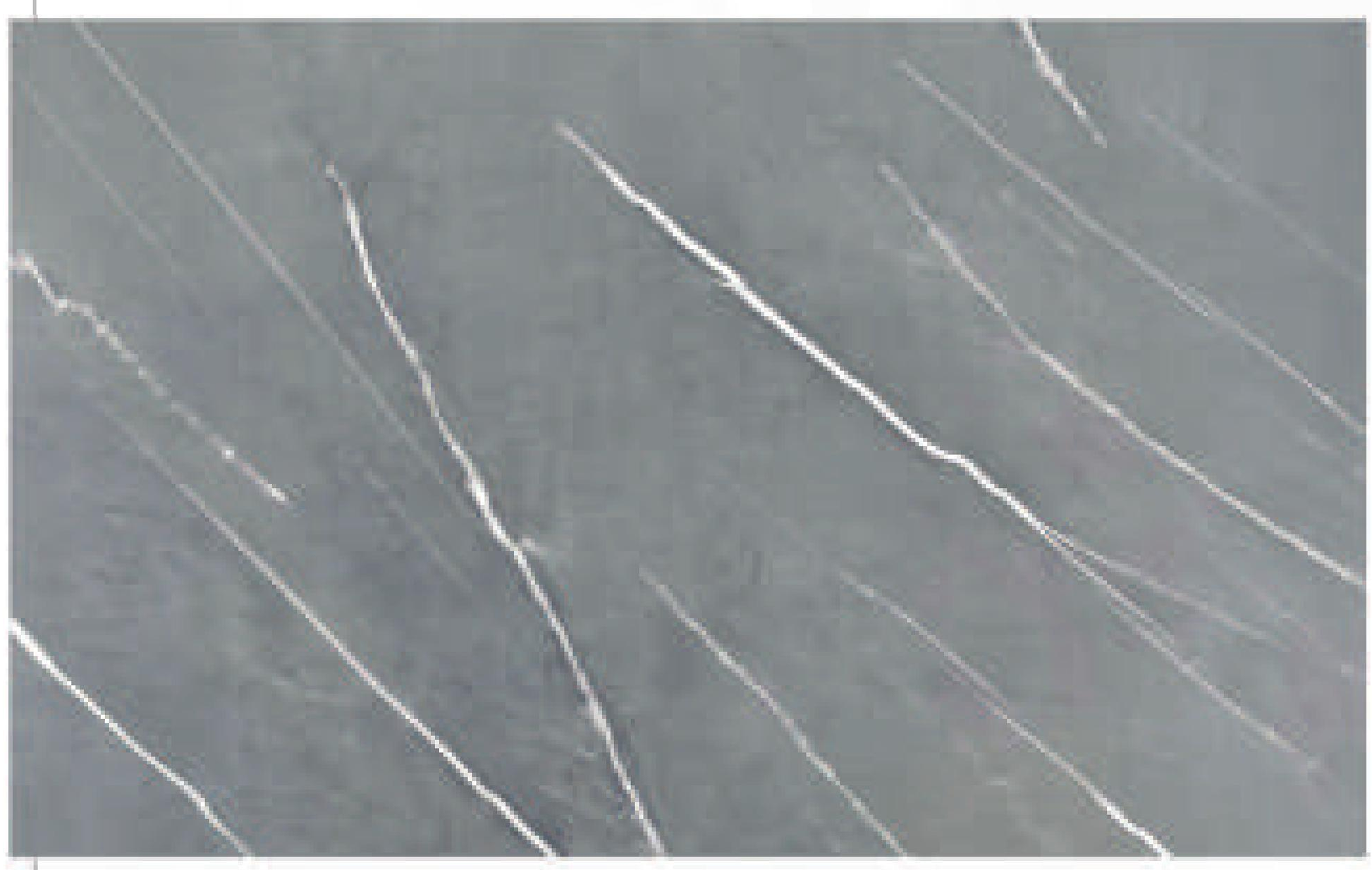 Grey decorative MDF sheet with glossy marble-like finish and white diagonal veining.