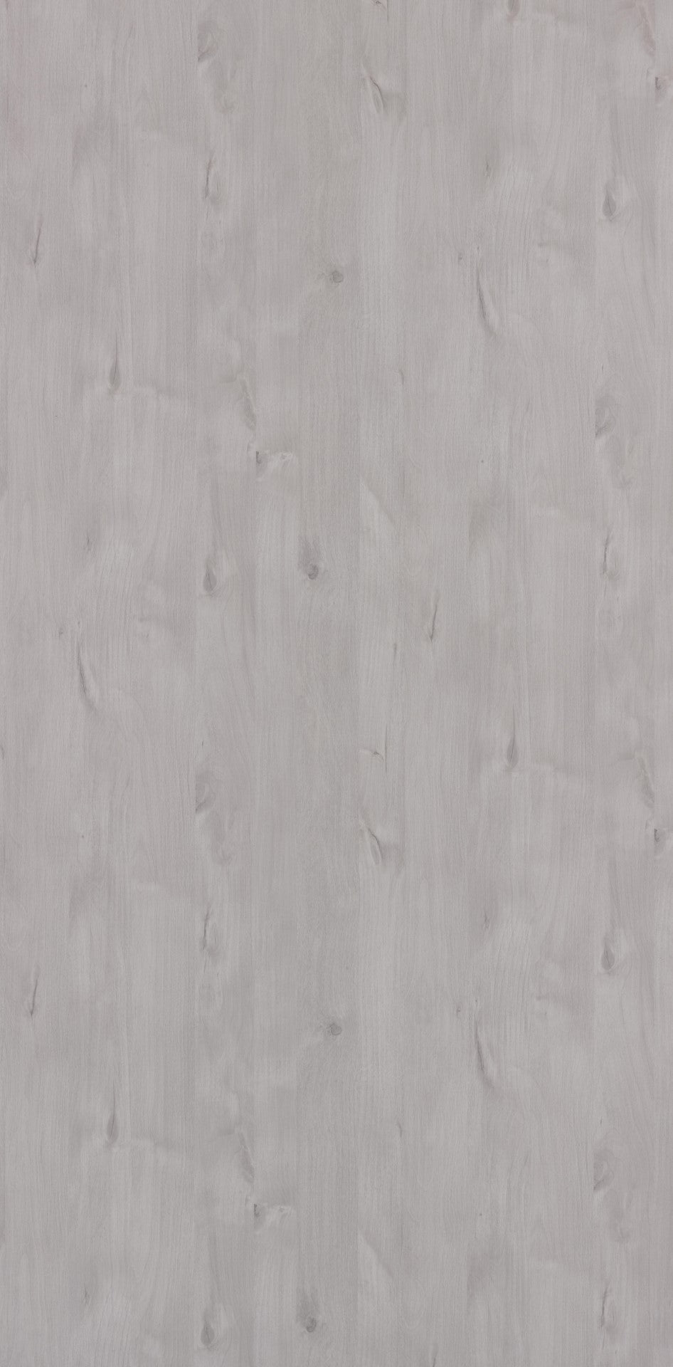 Grey wood grain laminate with suede finish and visible knots and texture