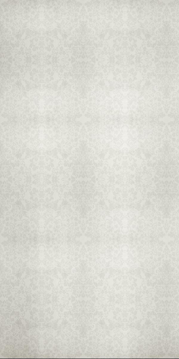 White decorative laminate with subtle suede finish and intricate pattern, showcasing designer texture and soft sheen.