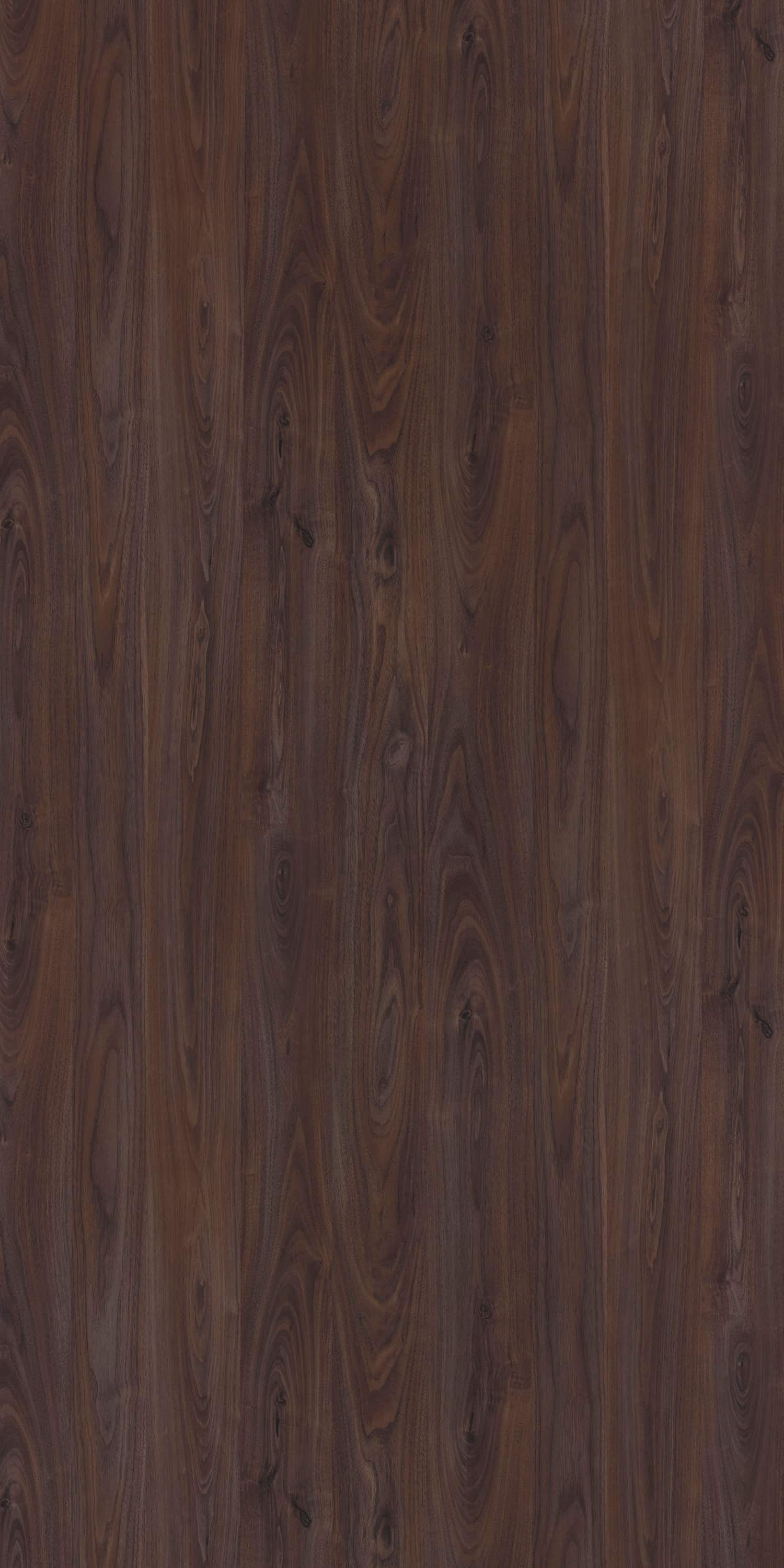 Brown wood laminate with suede finish and wood grain pattern, showing knots and swirling details in a vertical orientation.