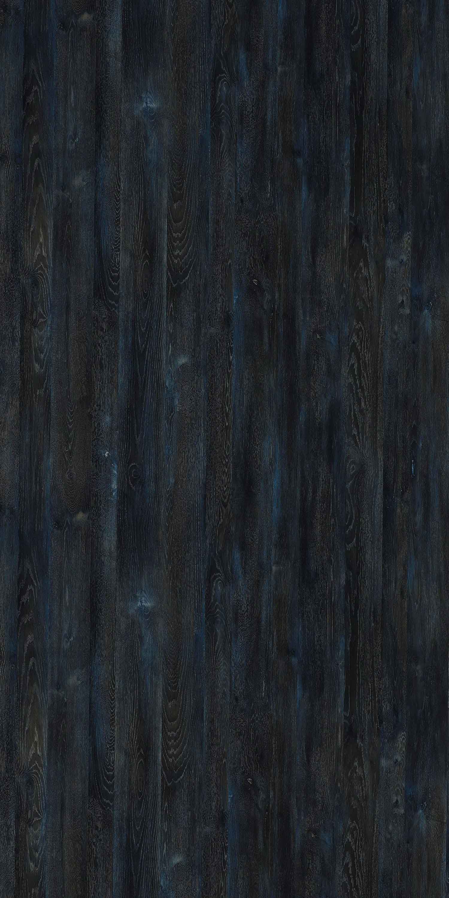Black wood grain laminate with glossy finish and visible texture and grain pattern.