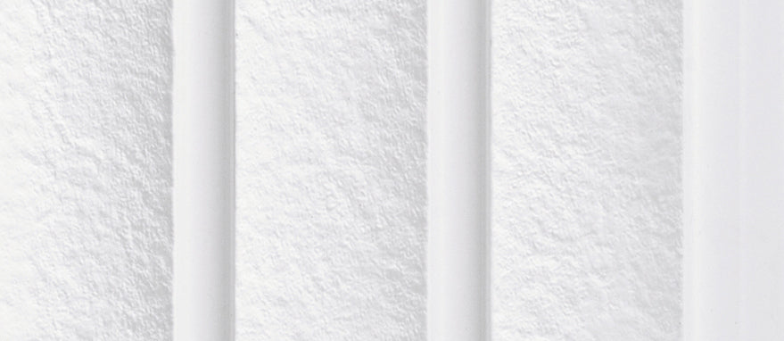 White textured louver panel with vertical slats and rough surface finish.