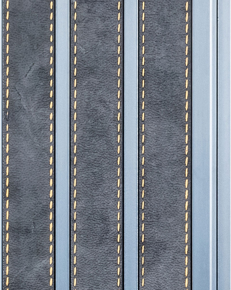 Brown textured designer wall louver panel with vertical slats and gold accents, showing texture and pattern details.
