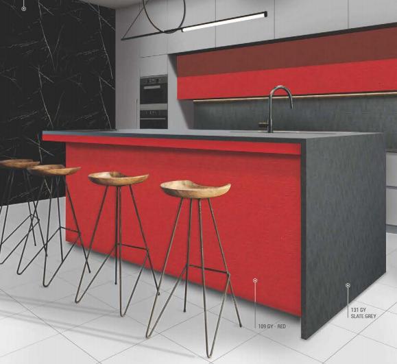 Red textured laminate kitchen island with grey countertop and stools, showcasing interior design with red and grey laminate