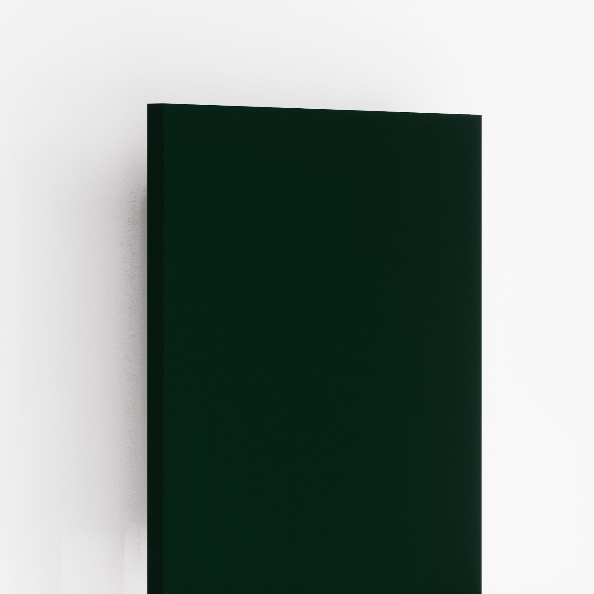 Bottle green plain laminate with glossy finish and smooth surface, showing edge detail and reflective sheen.