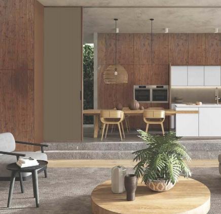 White laminate wall in modern living room with textured finish, adjacent to wooden wall and kitchen area with white cabinets
