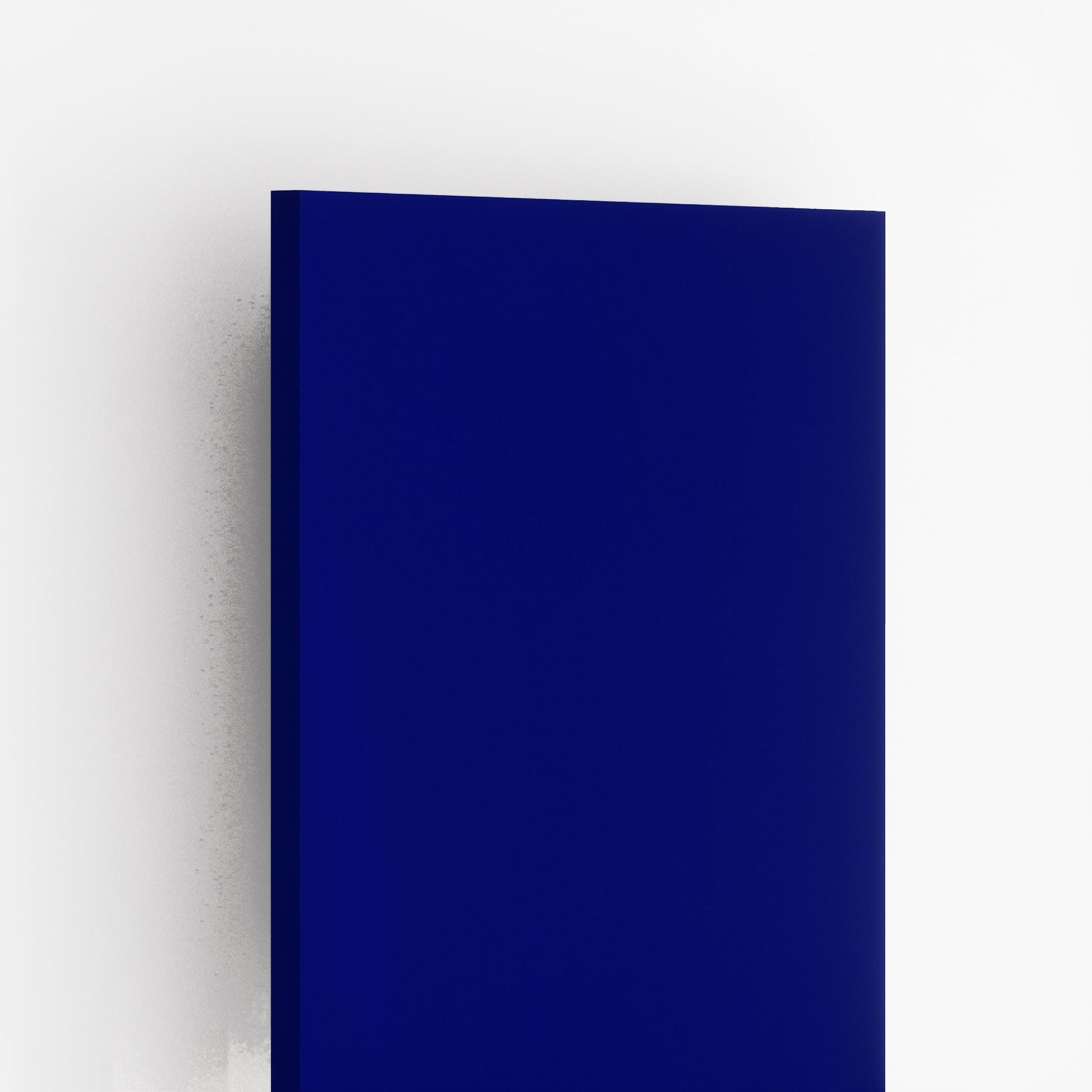 Blue suede laminate sheet with plain solid color and visible edge against white background