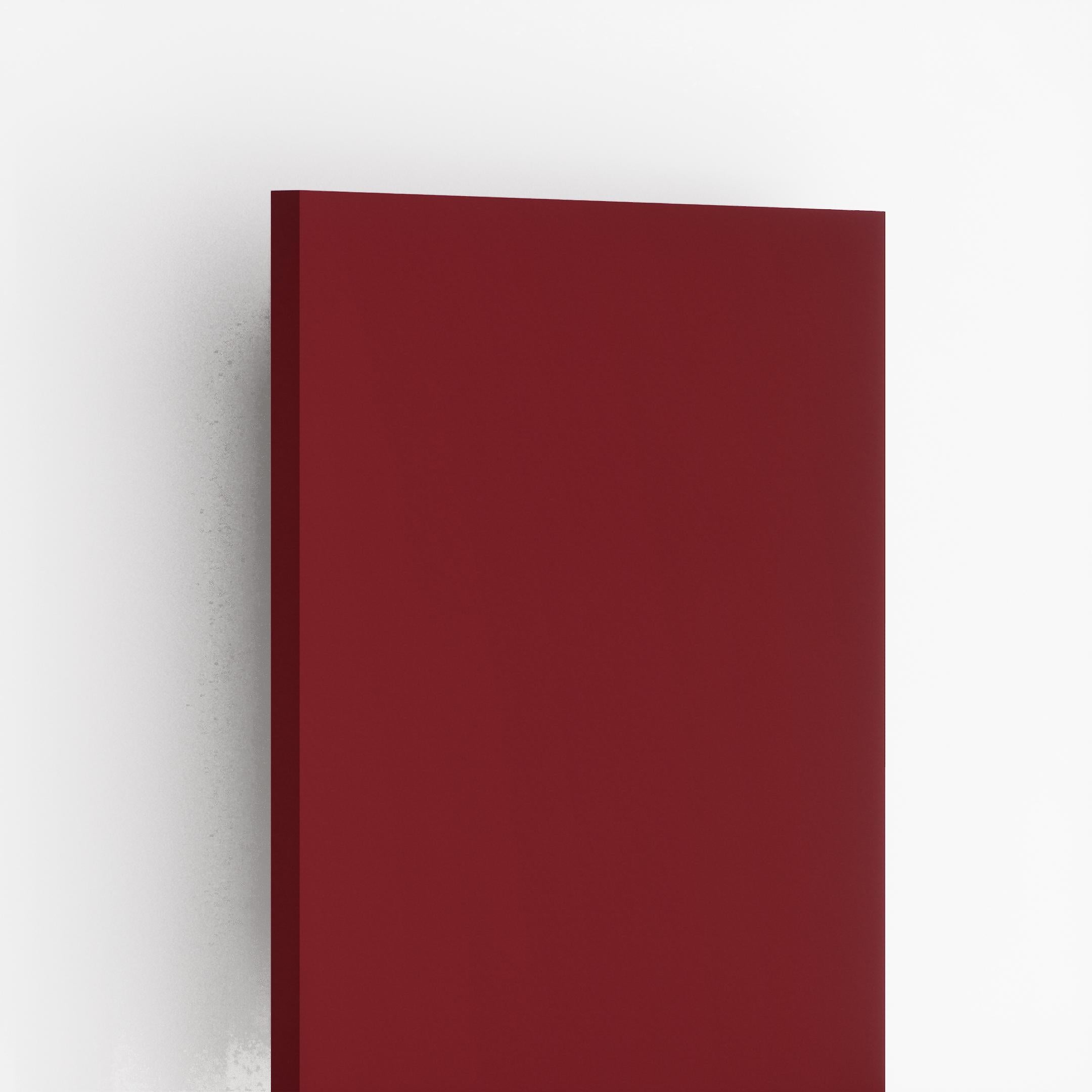 Rust red plain laminate sheet with textured finish, showing thickness and subtle shadow effect on white background.