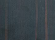 Brown wood grain laminate with suede finish and vertical wood pattern texture