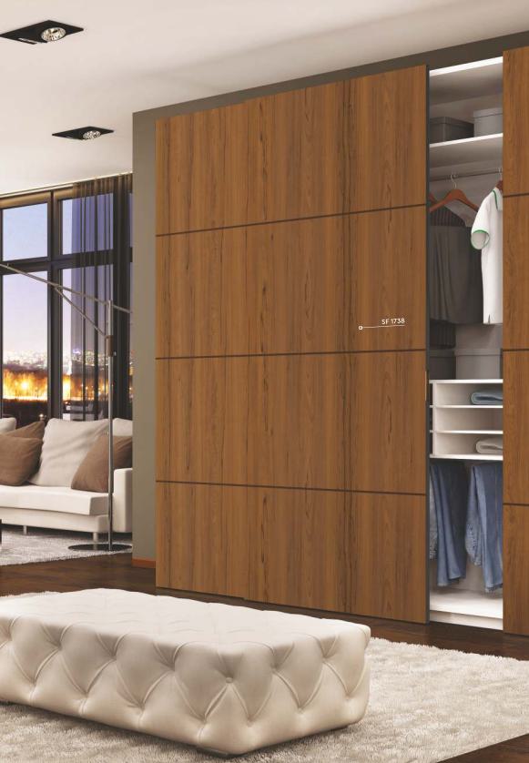 Brown wood laminate with wood grain texture and suede finish used on closet doors in modern interior design setting