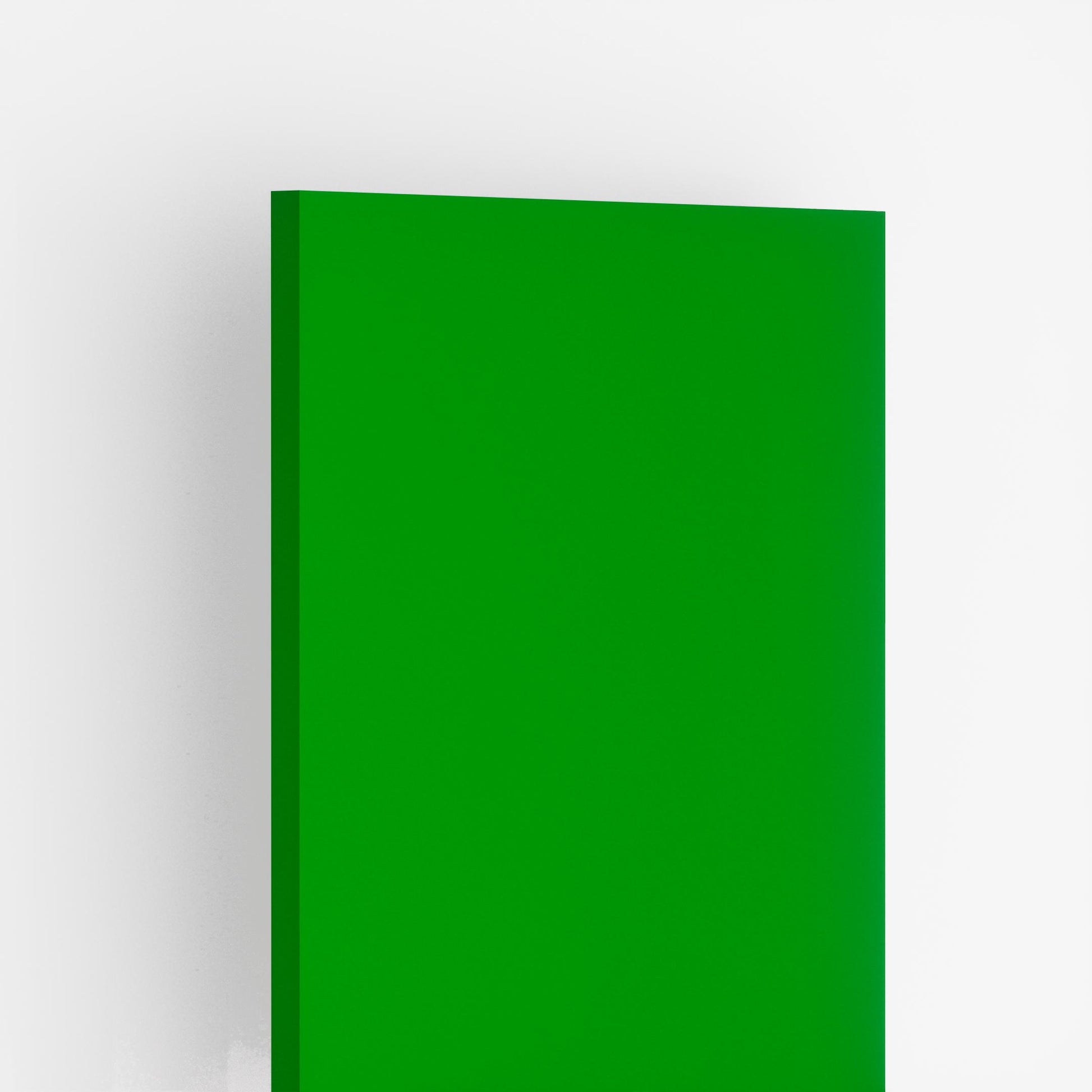 Green plain laminate with suede finish showing thickness and edge detail against a white background