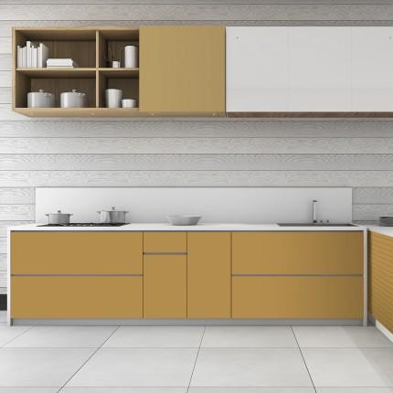 Beige plain laminate with textured finish used in modern kitchen cabinets and shelves against gray wooden wall background