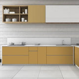 Beige plain laminate with textured finish used in modern kitchen cabinets and shelves against gray wooden wall background