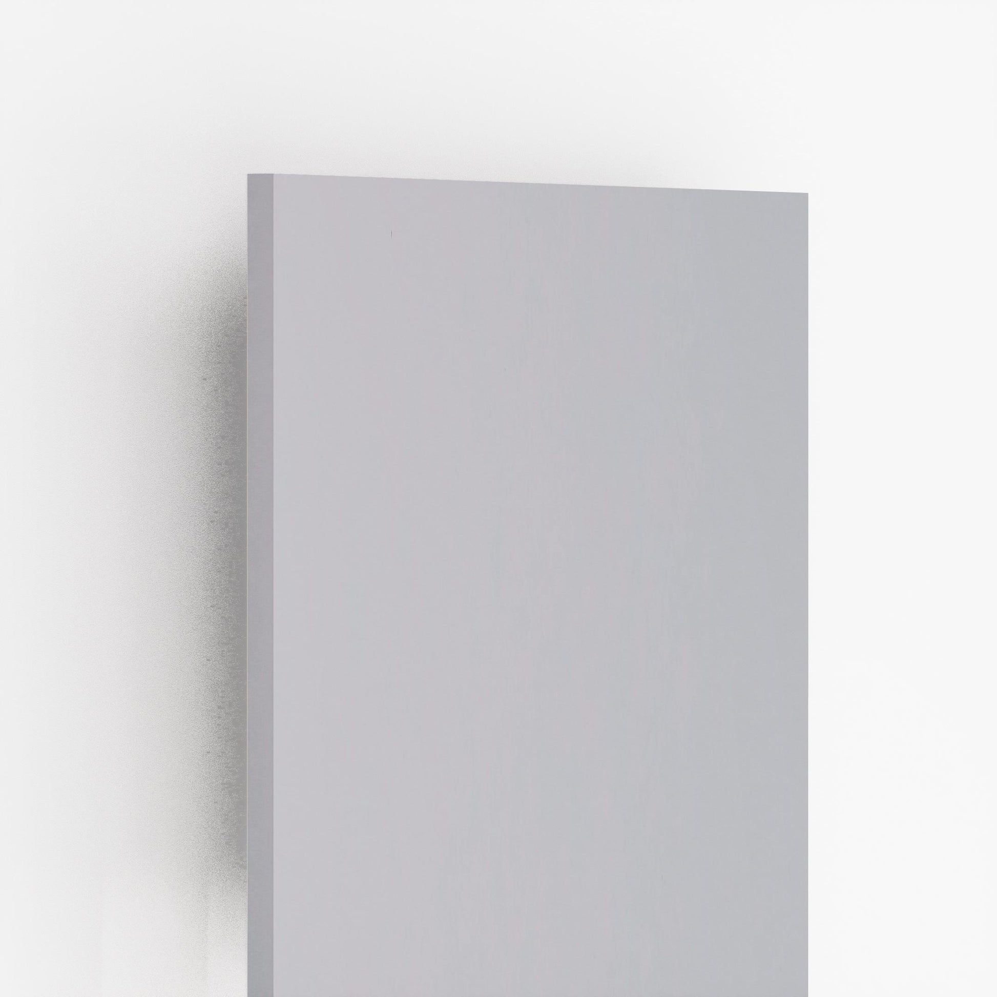 Grey laminate wall panel with silk finish and smooth texture, showing edge detail and subtle shadow effect.