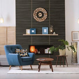 Black wood laminate wall with matte finish, featuring wood grain texture, in a modern living room interior setting.