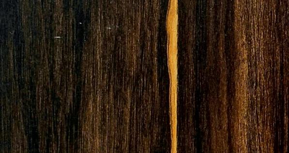 Brown wood grain laminate with textured finish and vertical wood pattern, showing natural wood appearance with darker and