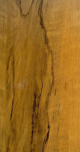 Brown wood grain laminate with textured finish and visible wood pattern and dark veins