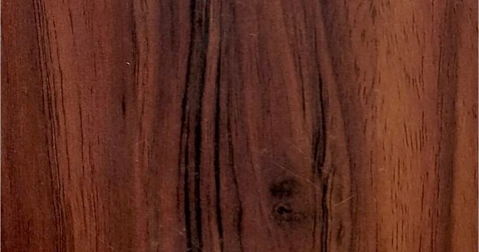 Brown wood grain laminate with textured finish and visible wood pattern and knots