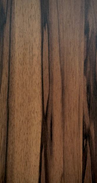 Brown wood grain laminate with suede finish, showing wood texture and dark brown streaks and grain pattern.