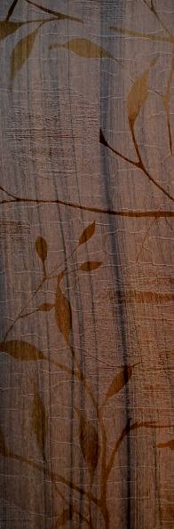 Brown wood grain laminate with textured finish and leaf pattern, showing visible wood texture and grain details.
