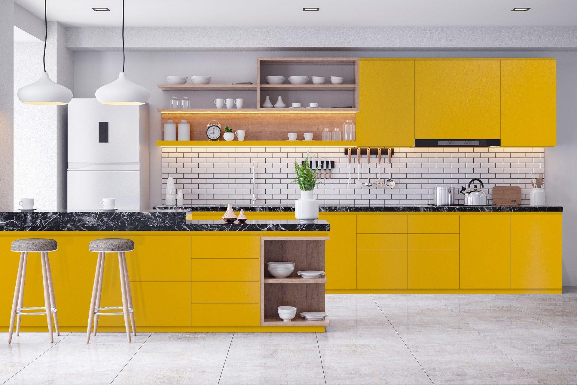 Yellow laminate kitchen cabinets with suede finish in modern kitchen setting showcasing plain color and texture