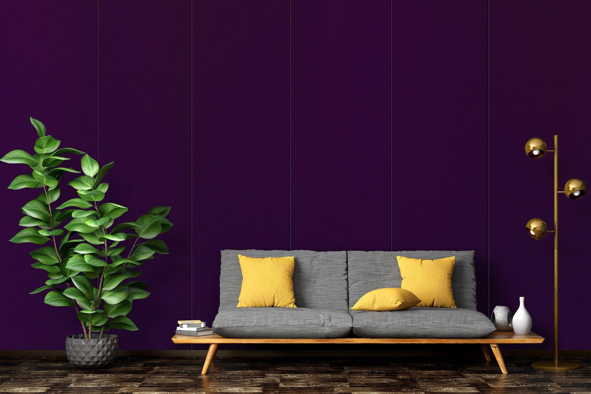 Purple suede laminate wall with vertical panels in a modern living room setting with gray sofa and decor items