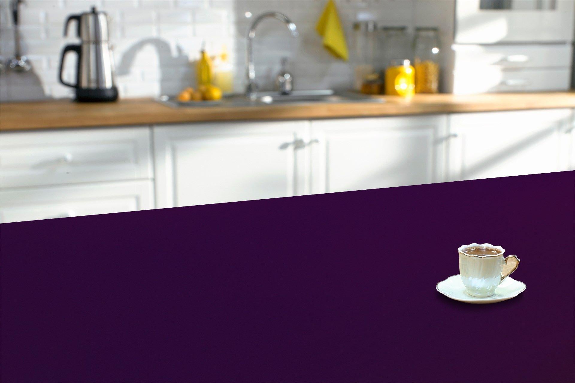 Purple suede laminate countertop with a cup and saucer in a kitchen setting, showing plain color and matte finish.