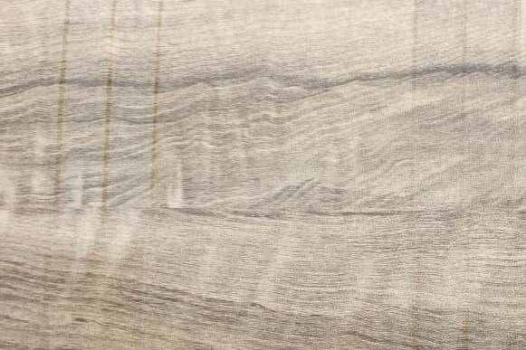 Cream wood grain laminate with textured finish and visible wood pattern and grain details