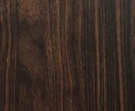 Dark wenge wood laminate with suede finish, showing wood grain texture and vertical stripes in varying shades of brown.