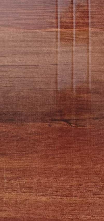 Dark wood grain laminate with textured finish and visible wood pattern and grain details