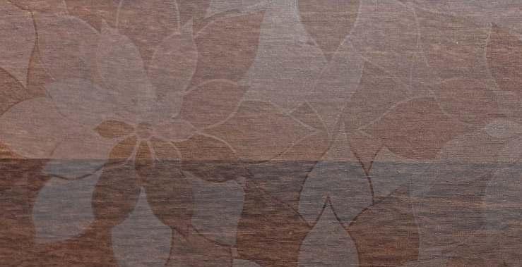 Wenge wood laminate with textured finish and wood grain pattern, showing natural variations and subtle sheen on decorative