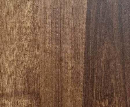 Brown wood laminate with suede finish showing wood grain texture and varying shades of brown in a vertical pattern
