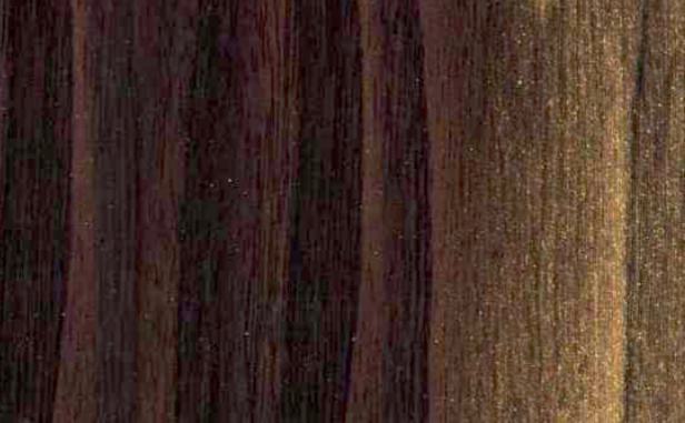 Brown wood grain laminate with textured finish showing wood pattern and grain details