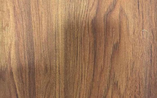 Brown wood grain laminate with textured finish and vertical wood pattern.