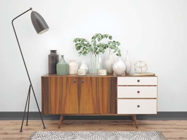 Brown wood grain laminate texture on cabinet top with vases and plants, showing wood pattern and textured finish