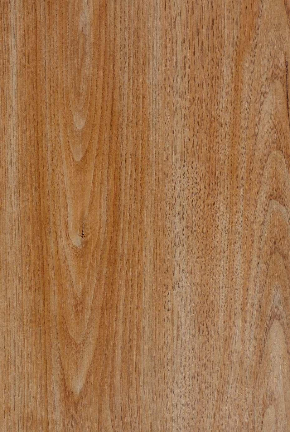 Brown wood grain laminate with textured finish and visible wood pattern and knots